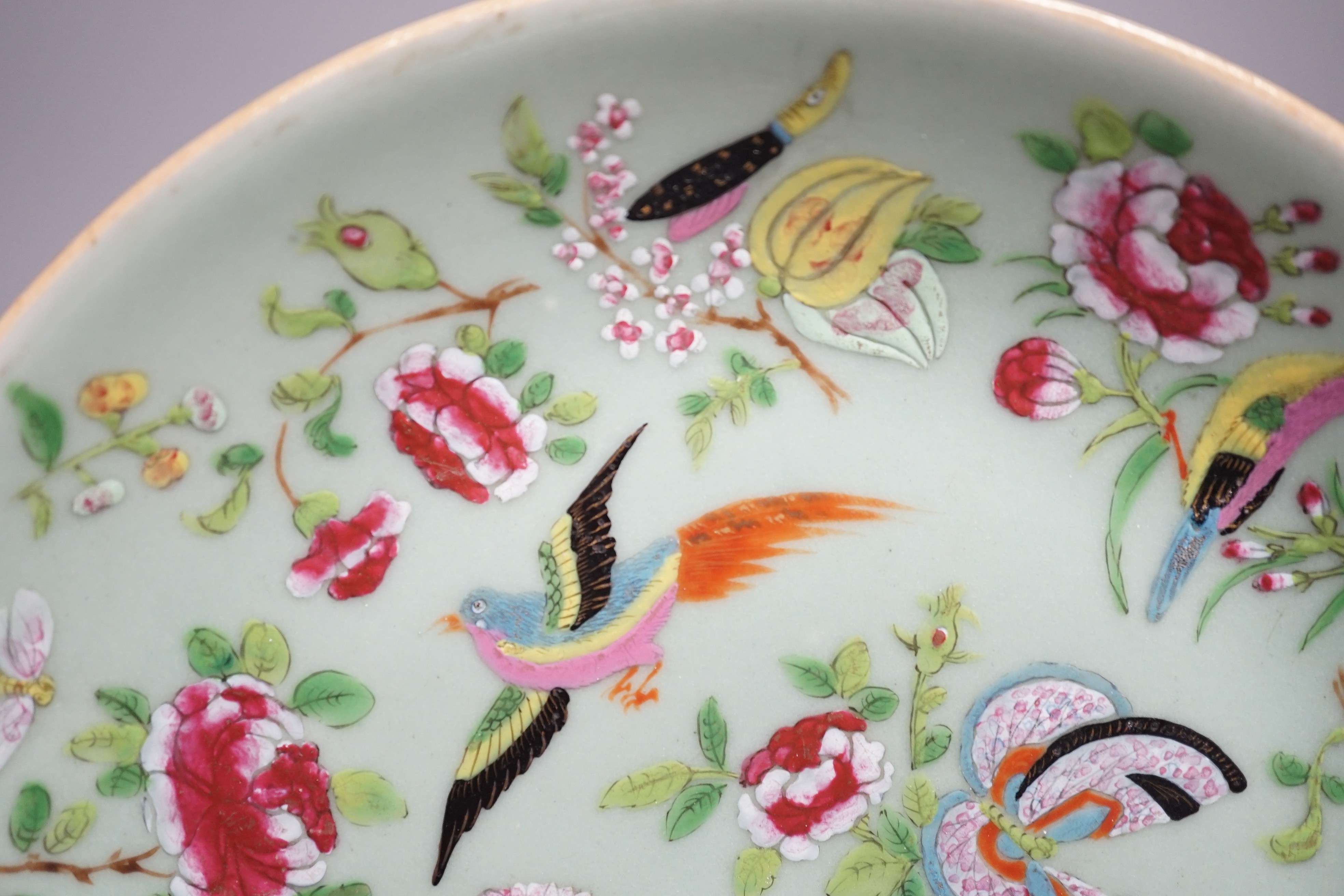 A Chinese celadon ground famille rose plate, Daoguang mark and of the period. 26cm diameter